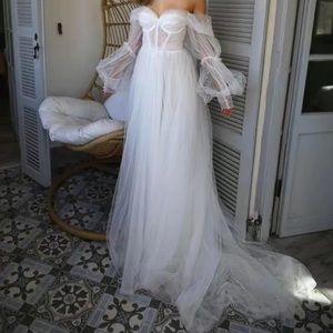 beautiful long sleeve tulle corset design wedding dress